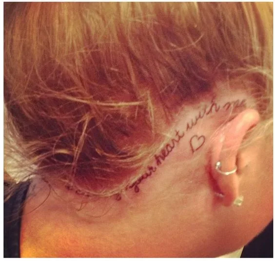 Lovely Heart Tattoo With Quote On Hairline