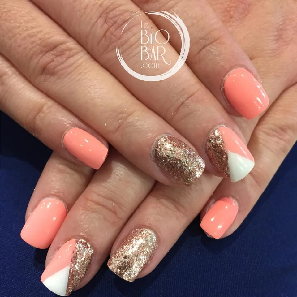 Coarl With Gold Glitter Nails Idea