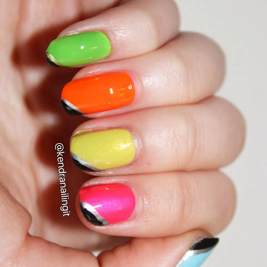 Neon Nails With Black And Silver Stripes At Corner