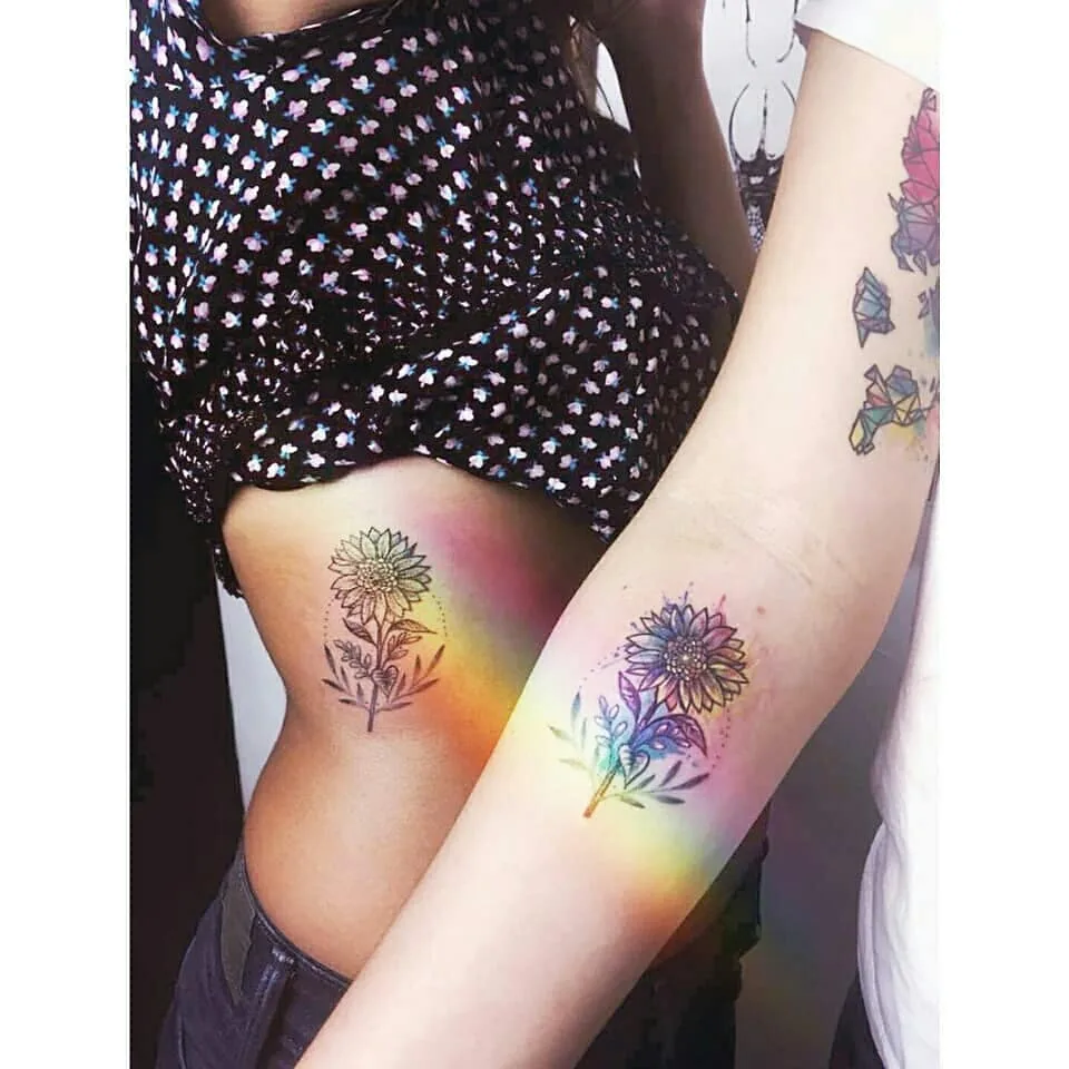 Sunflower Tattoo On Ribs And Forearm