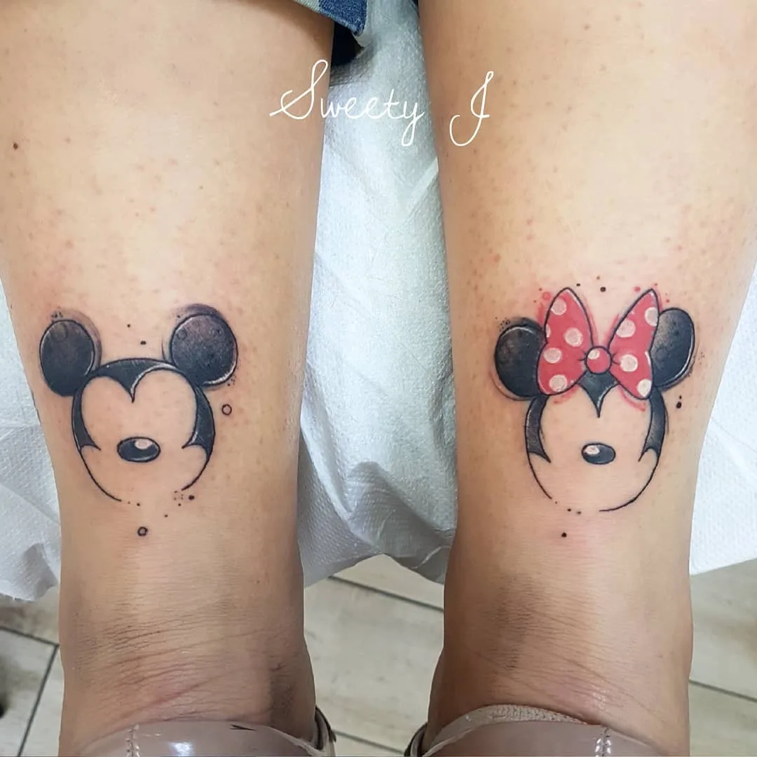 Trendy Mickey And Minnie Mouse Tattoo On Both Legs