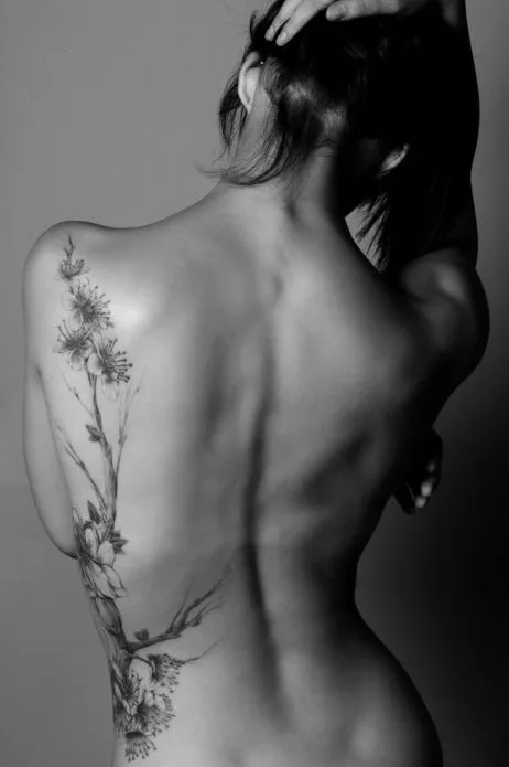 Glamorous grey dandelion and flower watercolor tattoo designs on side back for women.