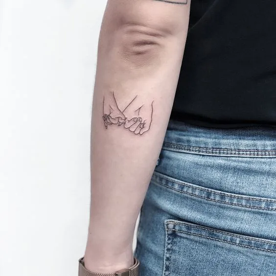 Great Couple Tattoo On Holding Hands.