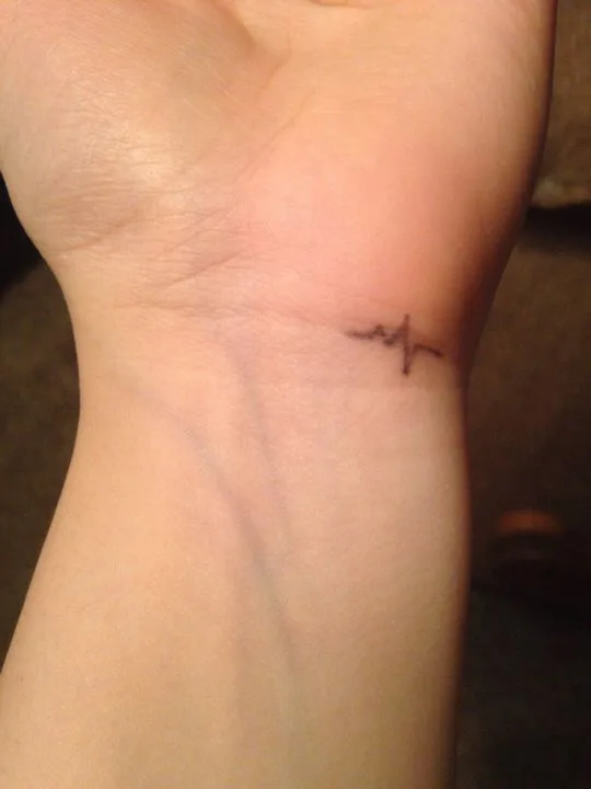 Little Heartbeat Wrist Tattoo.