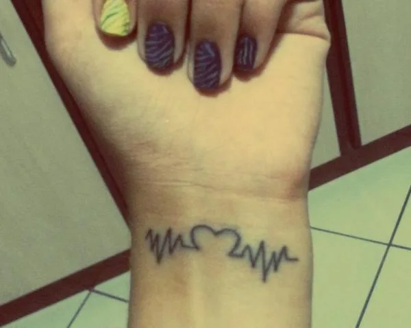 Love Is Heart Beat Tattoo.