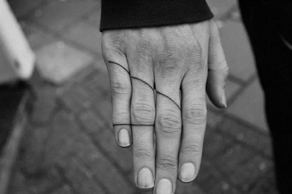 Tricky Tattoo On Fingers.