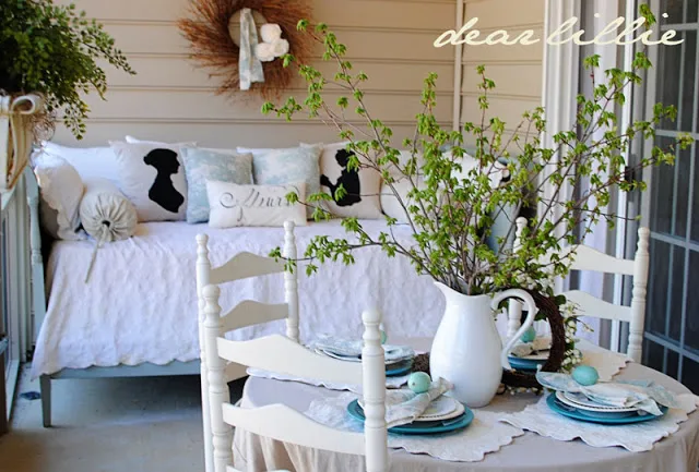 Easter table filled with playful shades of blues, intermingled with green and white.