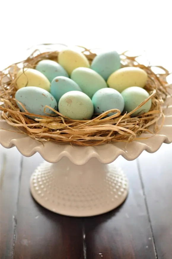 Painted egg nest as centerpiece.
