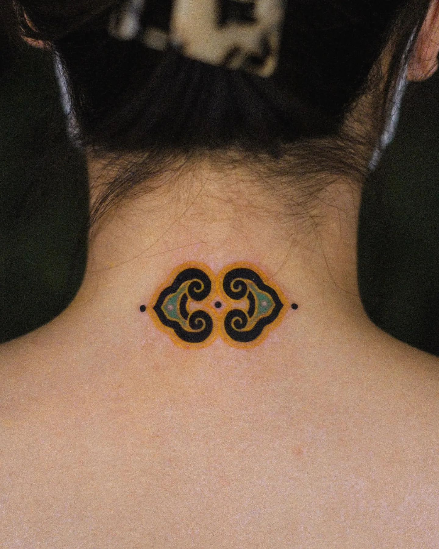 Aztec Inspired Vibrant Neck Tattoo