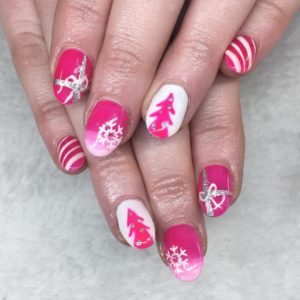 Pink and white Christmas nails. Pic by beauty_by_joan