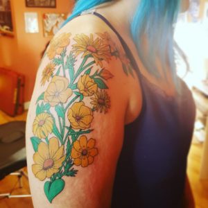 Yellow Flower On Arm