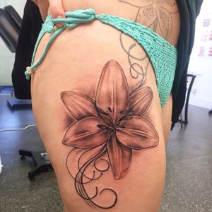 Amazing Lilly Tattoo On Thigh