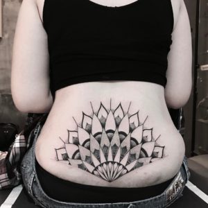 Line Work Lower Back Tattoo