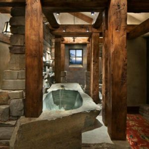 Stone Wall Wooden Pillar With Stone Bathtub Amazing Idea For Rustic Bathroom