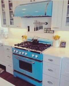 Beach Blue Stove & White Cabinets