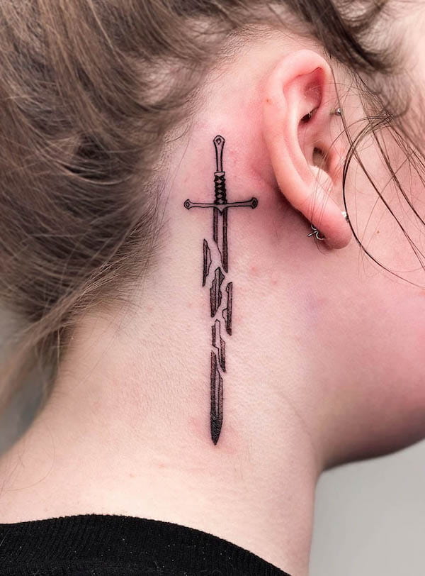 Elegant Sword Tattoo Behind the Ear