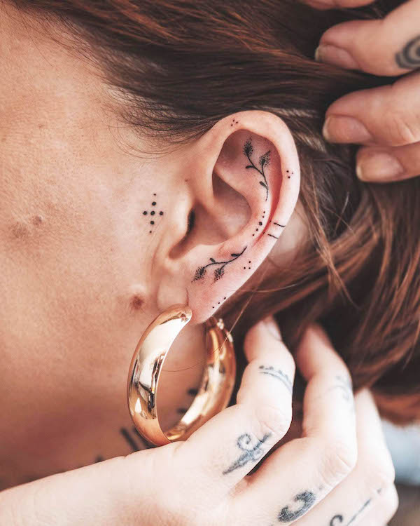 Ornamental ear tattoo