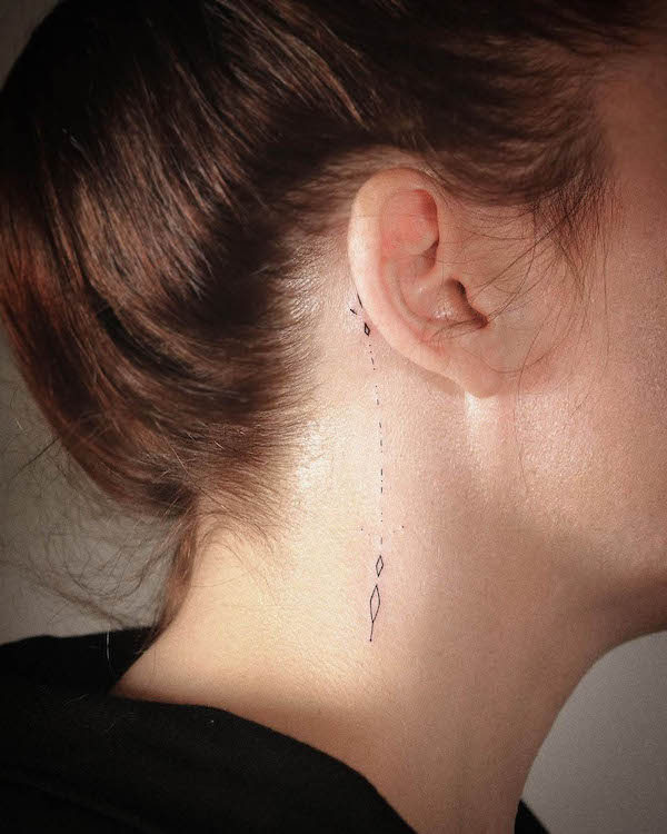 Minimalist Earring-Inspired Behind-the-Ear Tattoo