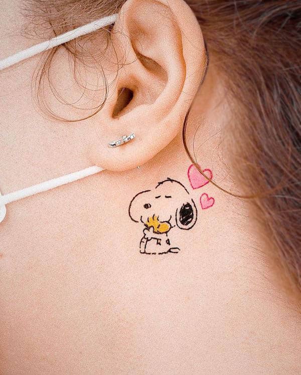 Adorable Snoopy Behind-the-Ear Tattoo