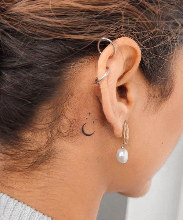 Delicate Moon and Stars Behind-the-Ear Tattoo