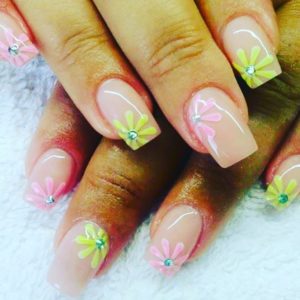 Pink And Yellow Flower Nail Art With A Glossy Touch