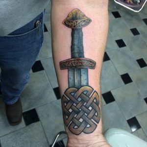 A sword tattoo designed in Celtic theme.