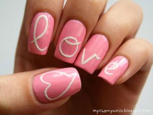 Simple pink love nails.