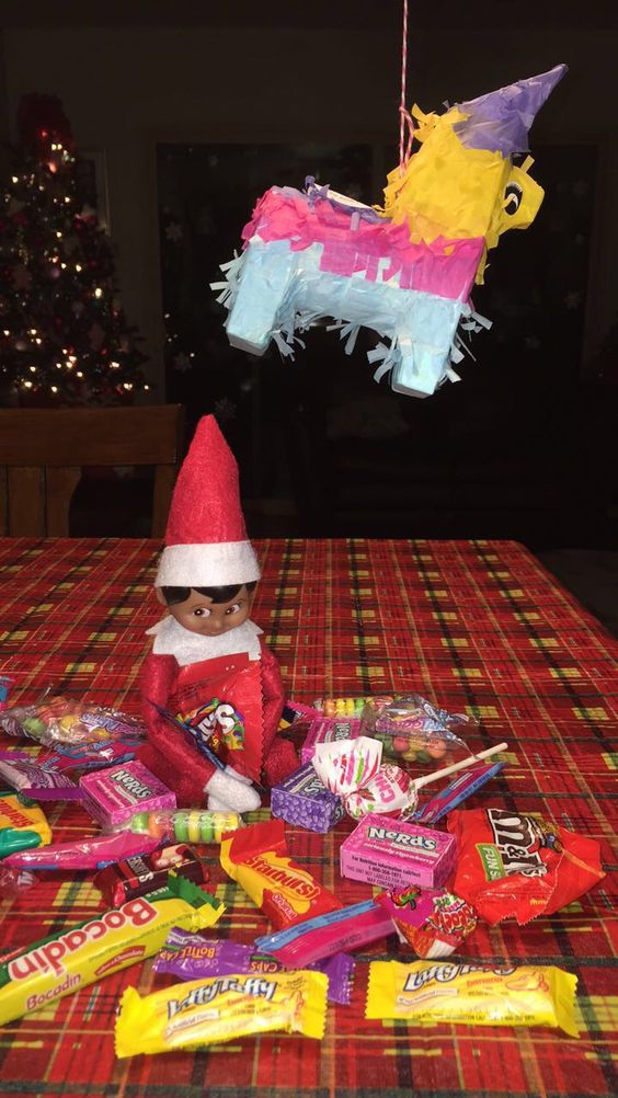 Elf on the shelf with pinata.