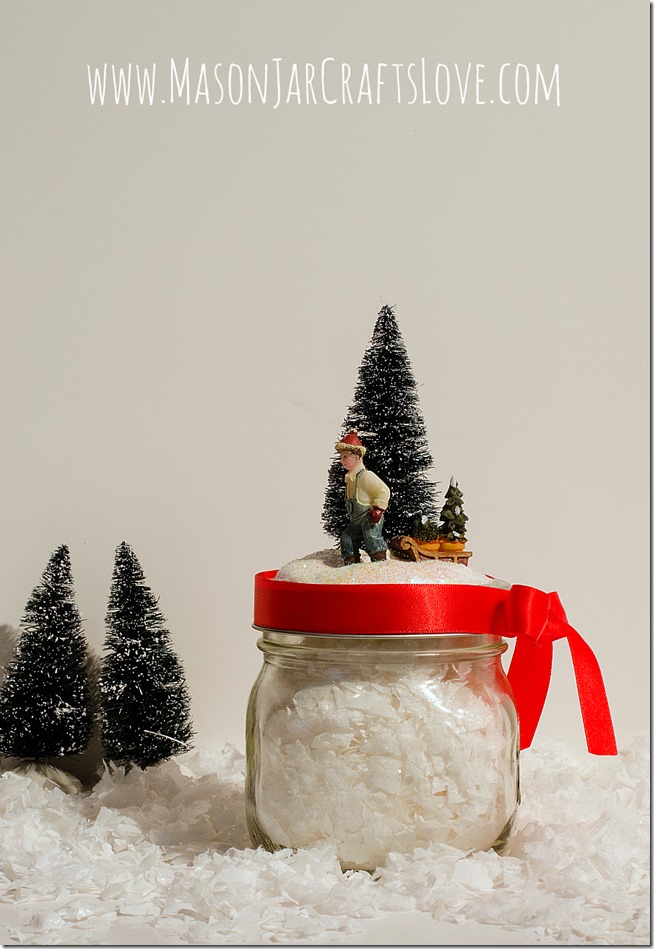 Festive mason jar decor with bottle brush tree.