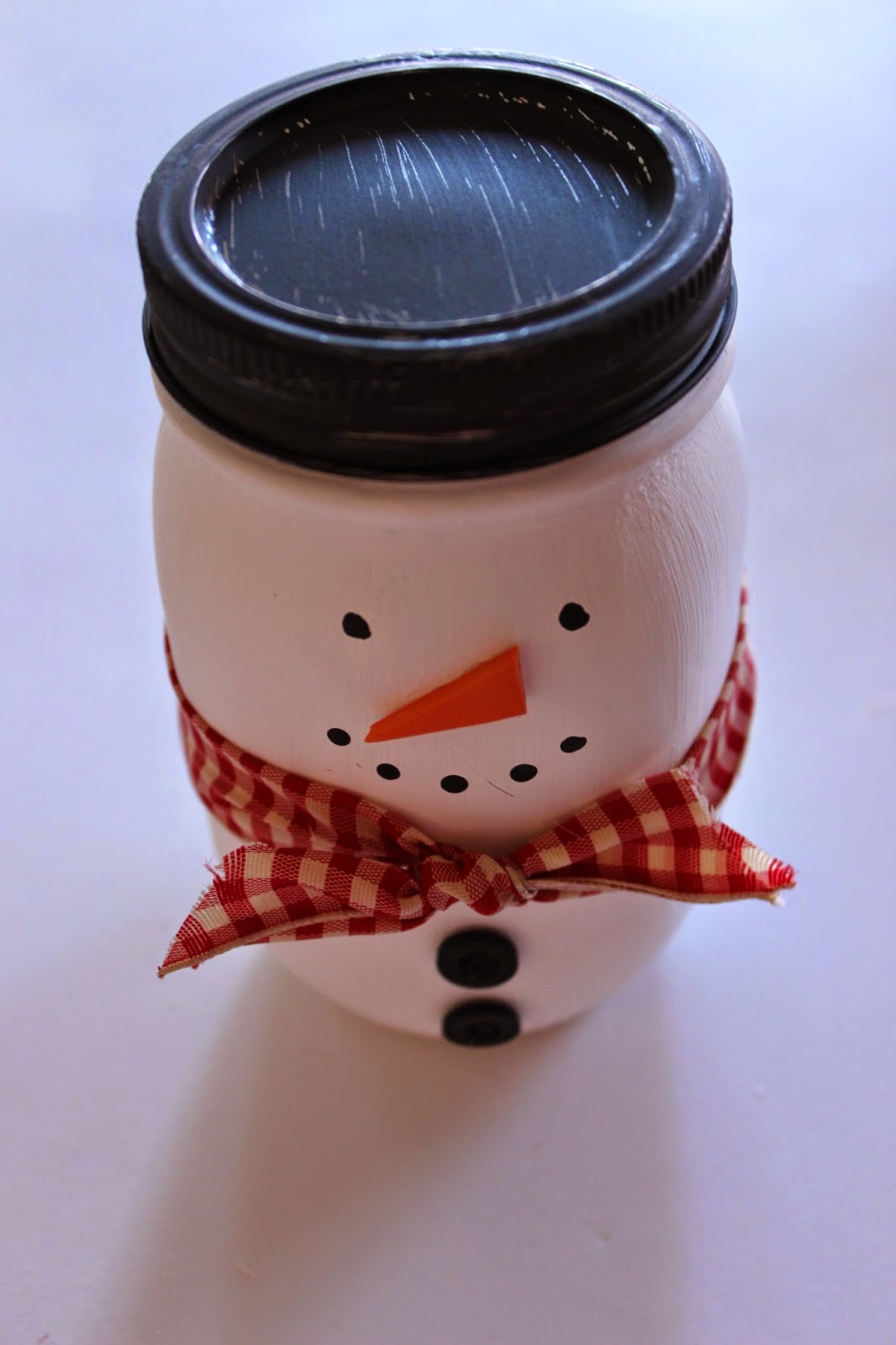 Painted mason jar snowman.