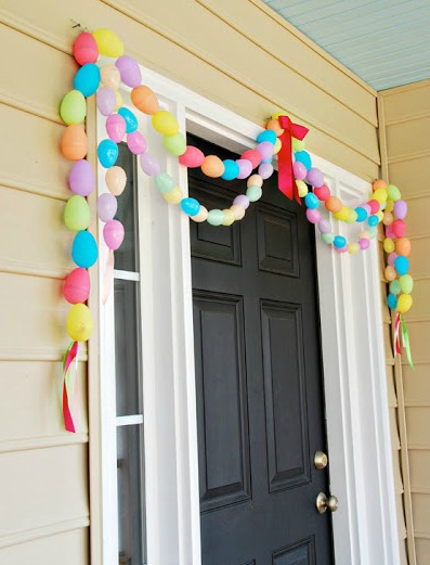 Adorable colorful egg garland for front door.