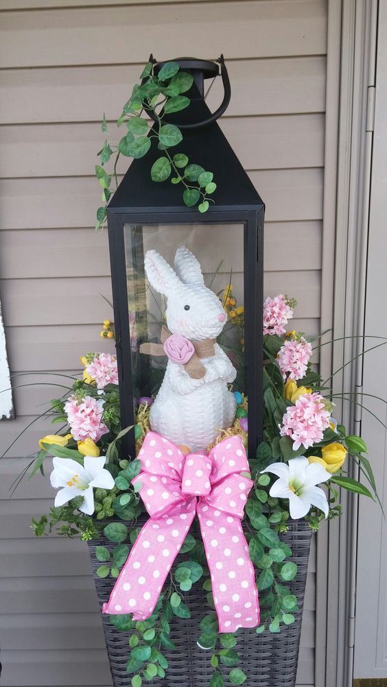 Bunny in the lamp used for outdoor decoration.