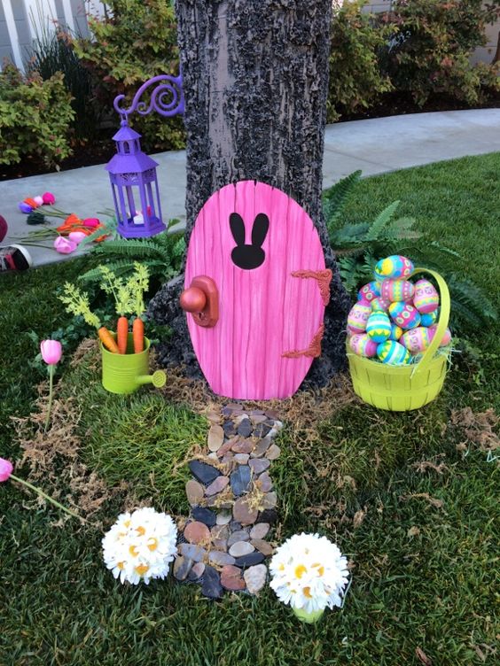 Outside bunny door with carrots and eggs.