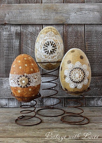 Unique paper mache Easter eggs on rusty bed springs.