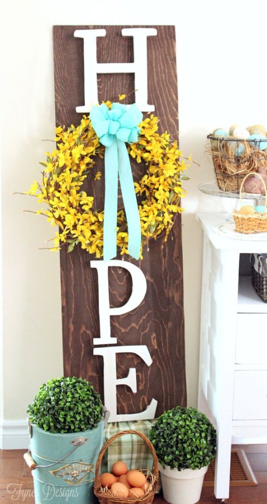 Wooden hope Easter wreath sign board.