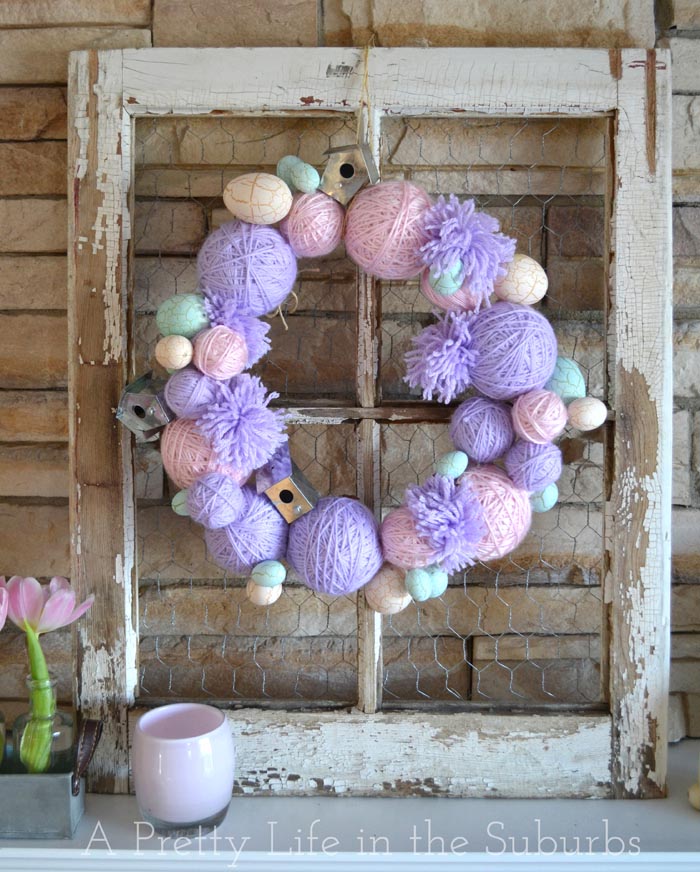 Yarn ball wreath in old frame.