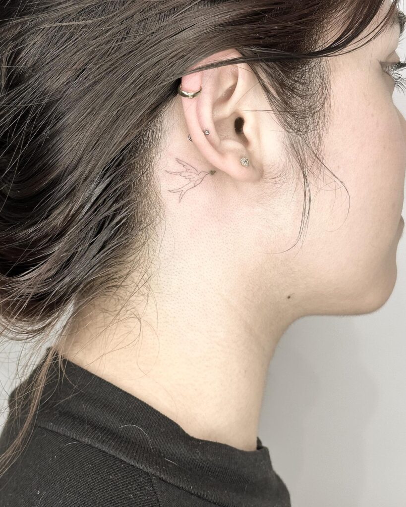 Bird Tattoo Behind the Ear