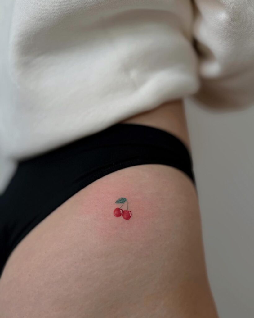 Colorful Cherry Hip Tattoo