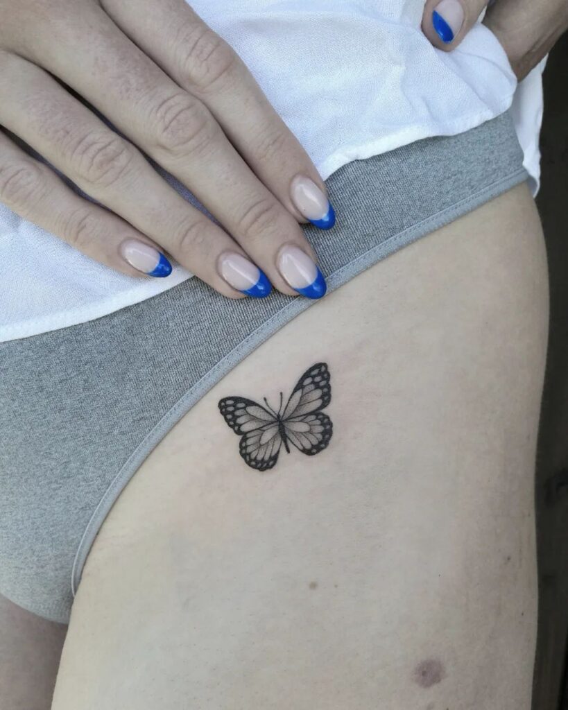 Small Butterfly Hip Tattoo