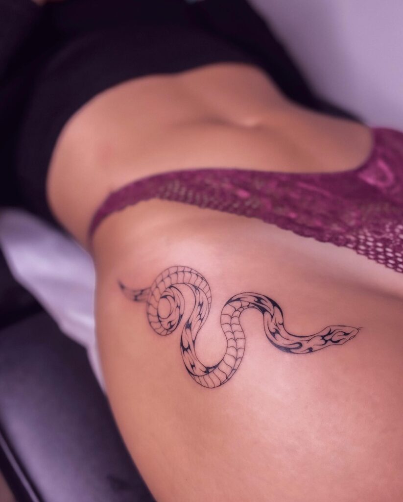 Small Snake Hip Tattoo