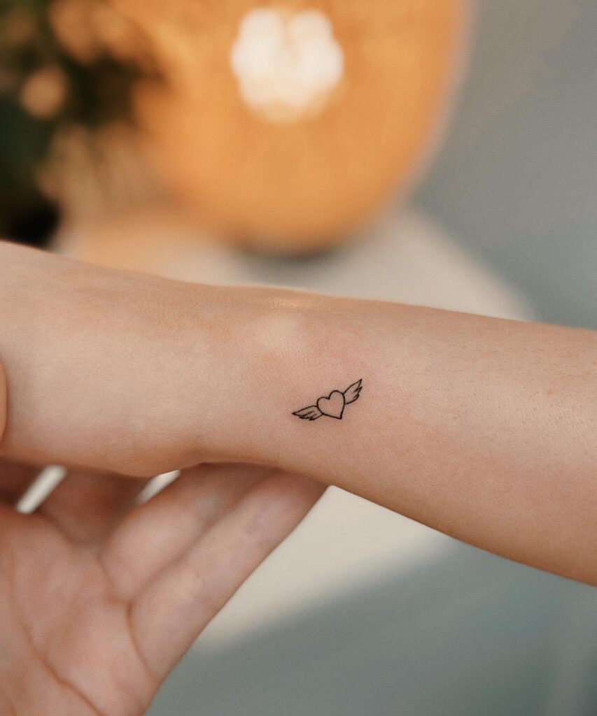 Wrist Heart with Wings Tattoo