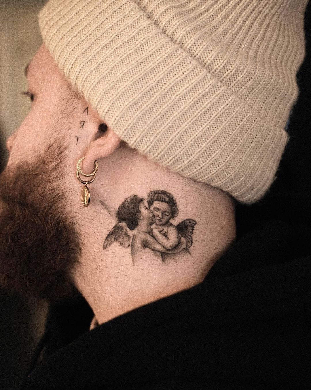 A Touch of the Divine Neck tattoo