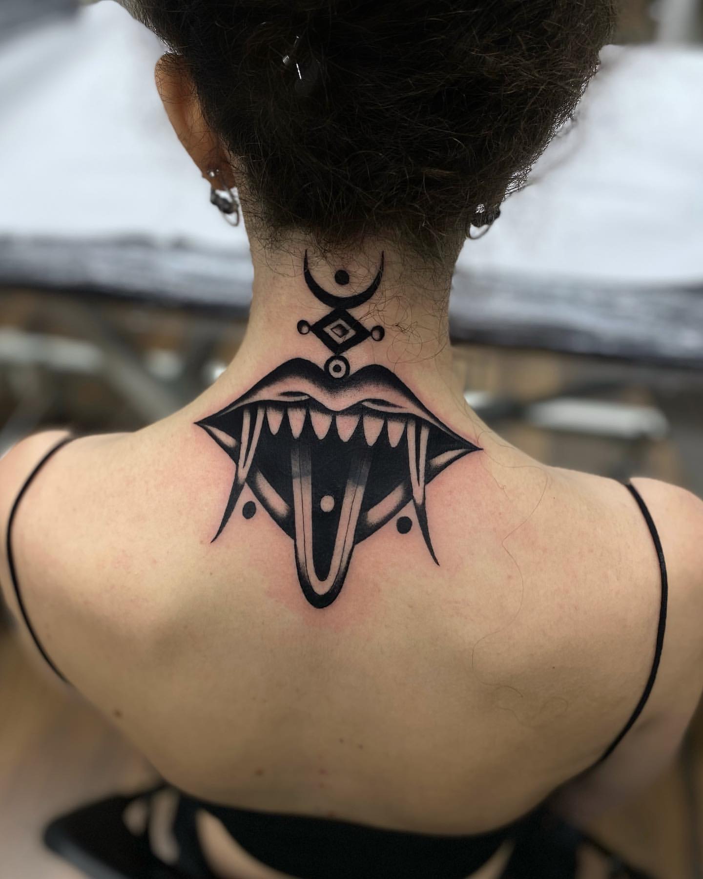 Black Inked Mouth Neck Tattoo