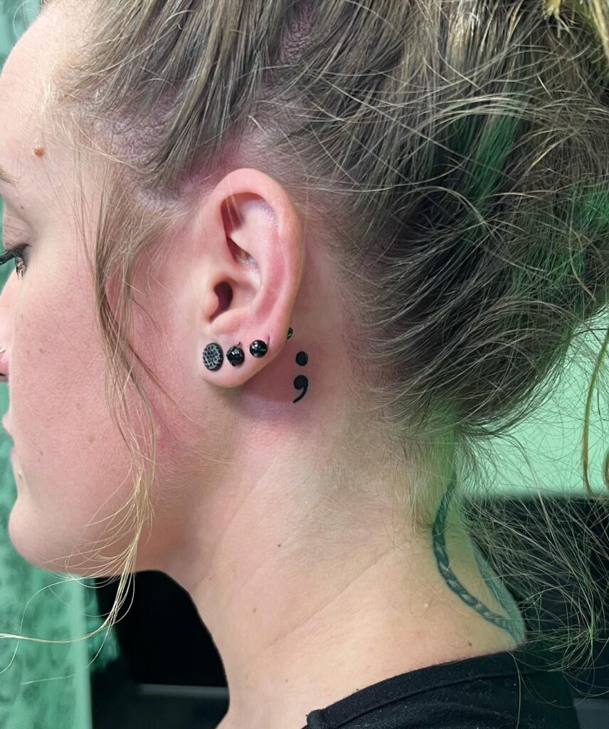 Black Semicolon Behind Ear