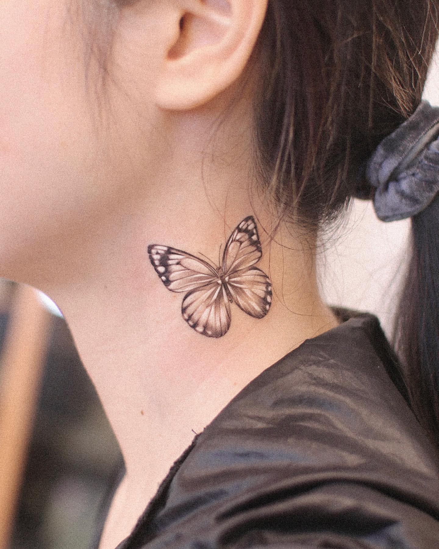 Butterfly Neck Tattoo