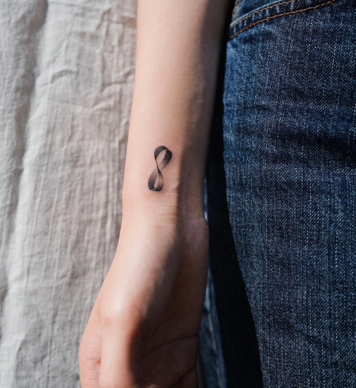 Dotted Infinity Tattoo