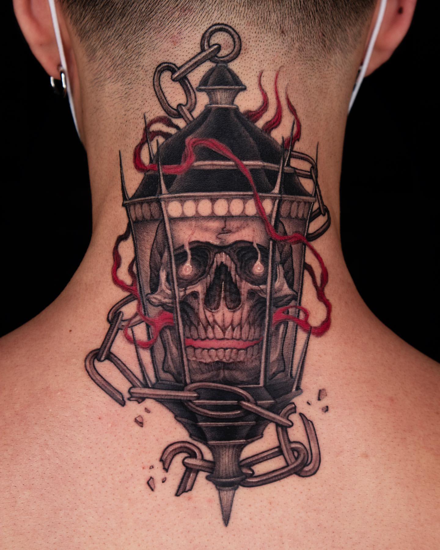 Macabre Lantern with Skull and Red Accents Neck Tattoo for Men