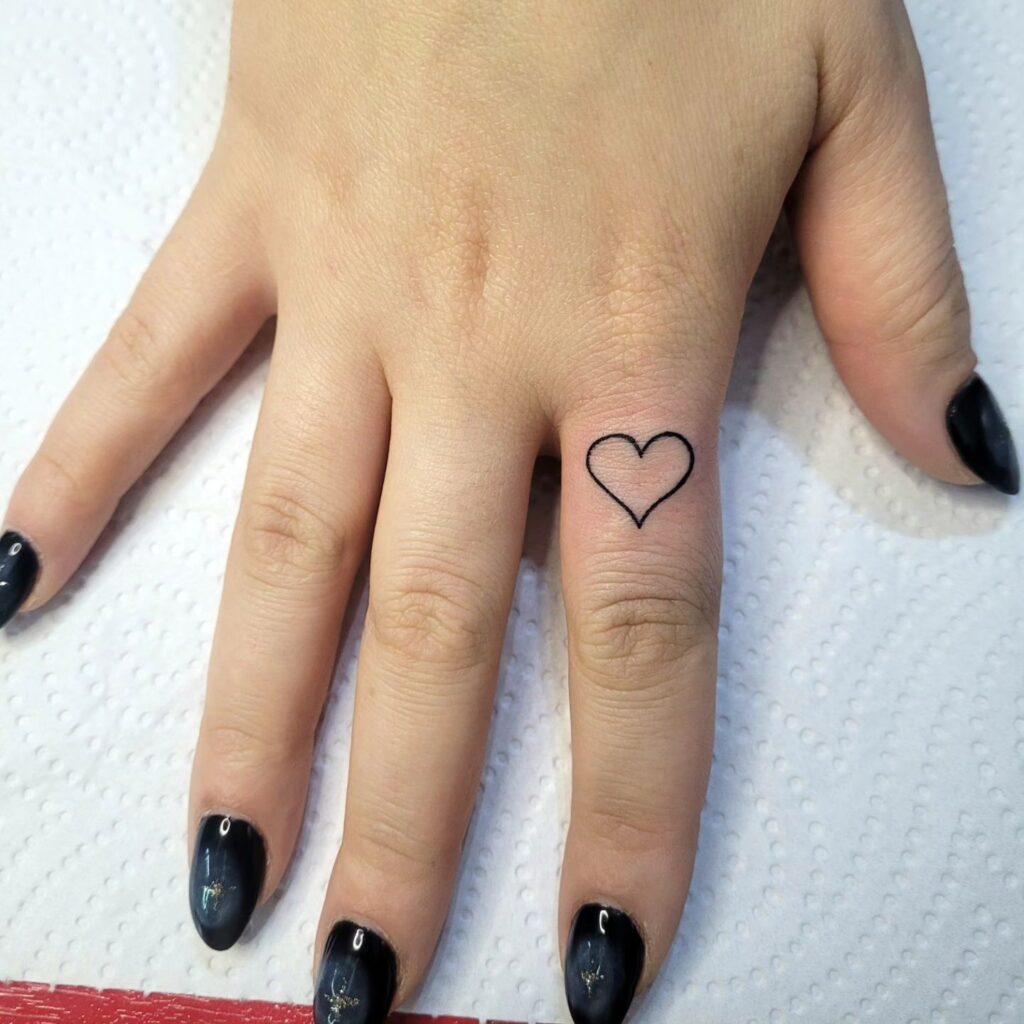 Outline Heart Tattoo on Forefinger