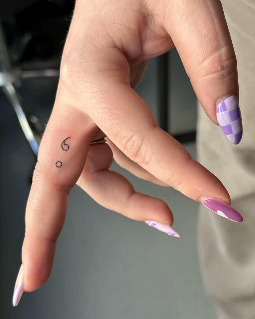 Outline Semicolon Finger Tattoo