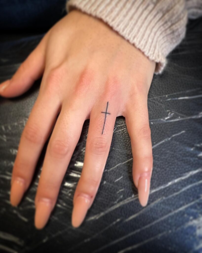 Ring Finger Cross Tattoo Design